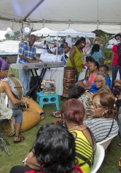 Drummers and audience under the Green Readings tent.