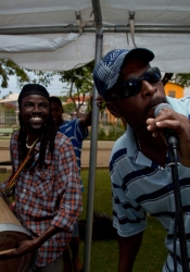 Peter "Bumbatuk" Bowen at the open mic, moved by master drummer James Lovell’s infectious tuk riddims!