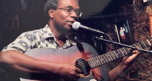 Former Nation newspaper senior editor Ridley Greene playing at the launch of ArtsEtc in 2004.