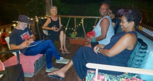 Sarah Venable (second from left) and Sonia Williams (second from right) at Sarah's birthday gathering, December 2023.