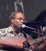 Former Nation newspaper senior editor Ridley Greene playing at the launch of ArtsEtc in 2004.