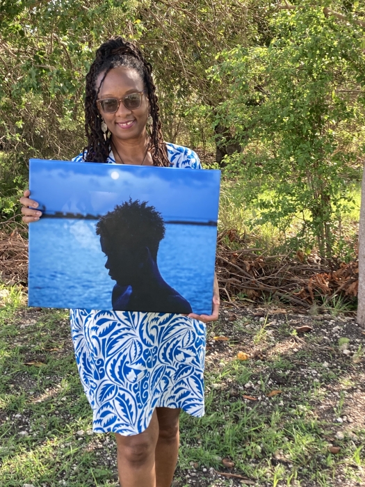 Linda M Deane (The Summer Storyteller) with photograph by Kai Miller -- a 60th birthday gift. Miller is one of many young and emerging artists ArtsEtc has worked with over its 20-year existence