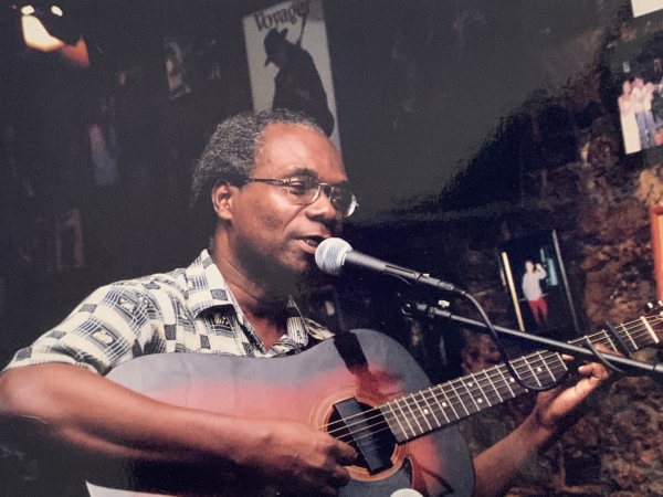 Former Nation newspaper senior editor Ridley Greene playing at the launch of ArtsEtc in 2004.