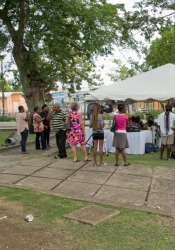 We gathered under a tent and on benches by the Solar House in Queen’s Park, Bridgetown.