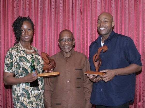 ArtsEtc Editor Linda M. Deane with top 2016 Frank Collymore Literary Award winner Kerry Belgrave.  Between them is then Governor of the Central Bank of Barbados DeLisle Worrell, January 2017.