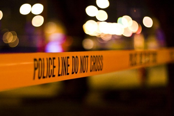 Image of police tape across a crime scene, used 2019.